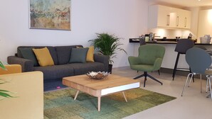 Design Apartment, 1 Bedroom, Lake View | Living room | 55-inch flat-screen TV with cable channels, Smart TV, pay films - Montreux lake view Residence (Montreux)