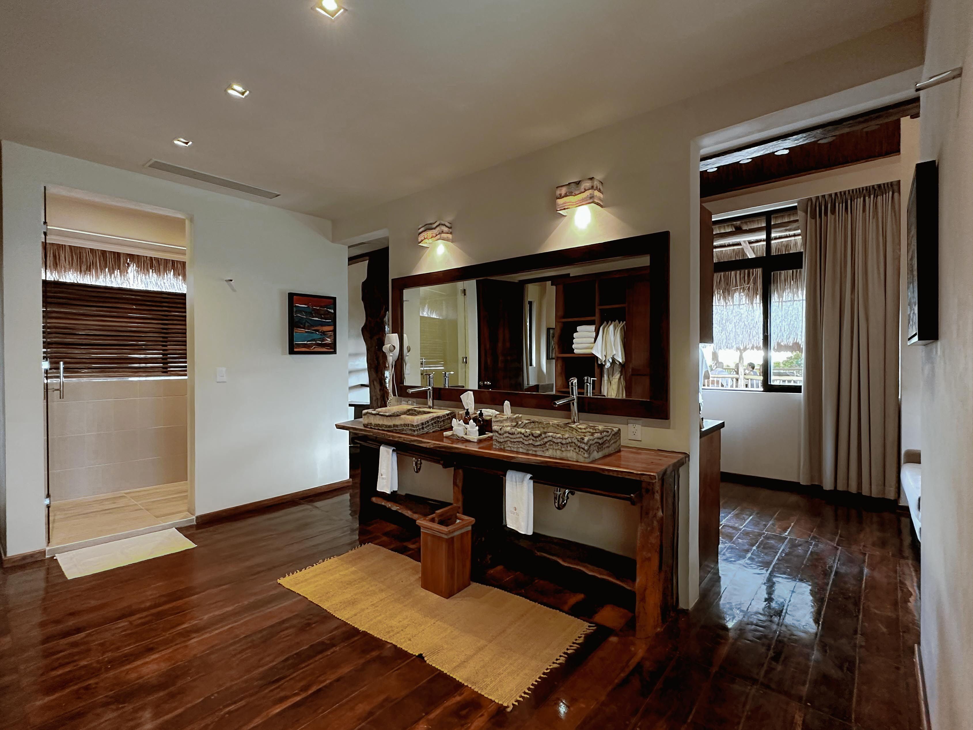 shower, rainfall showerhead, designer toiletries, hair dryer