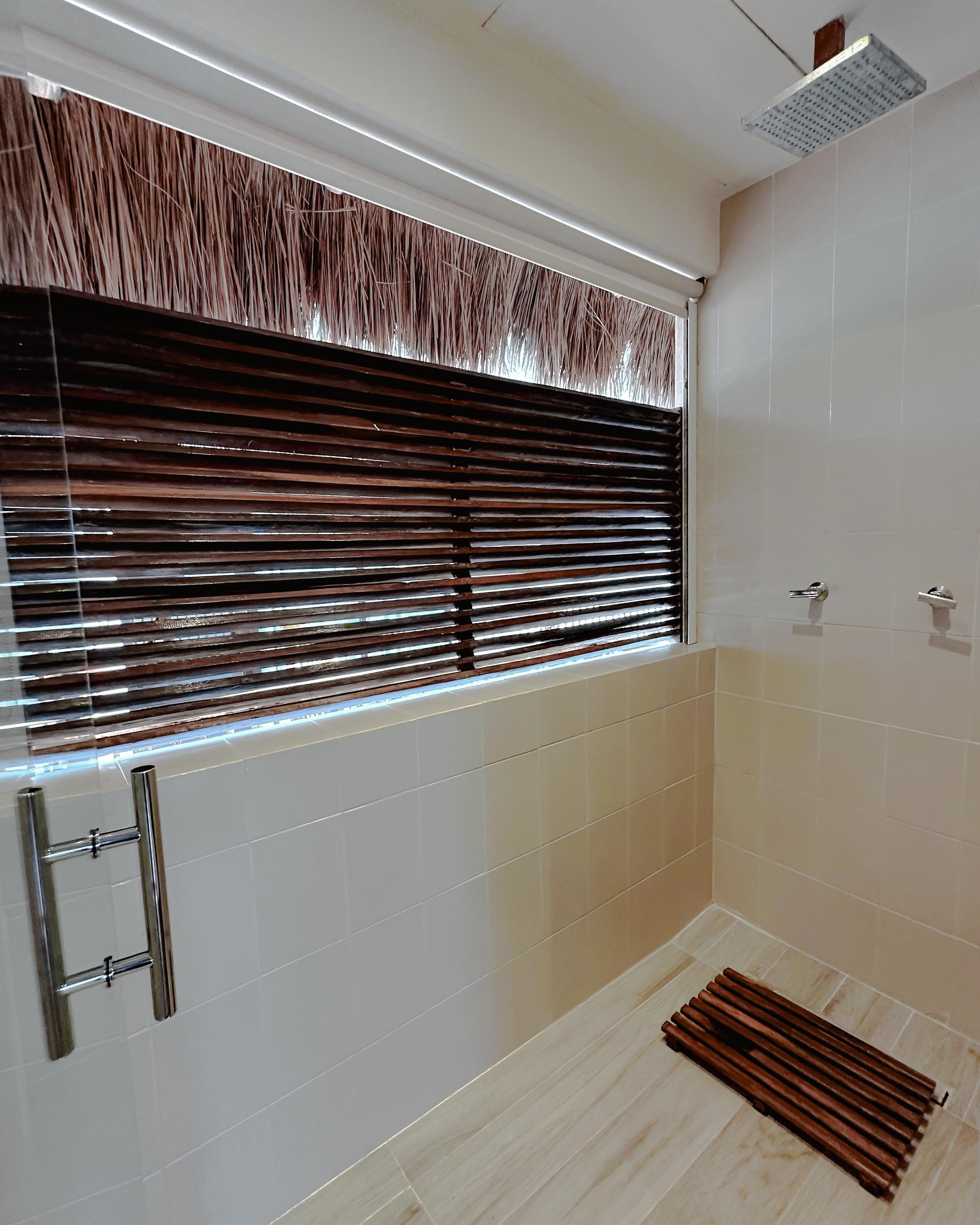 presidential suite | bathroom | shower, rainfall showerhead, designer toiletries, hair dryer