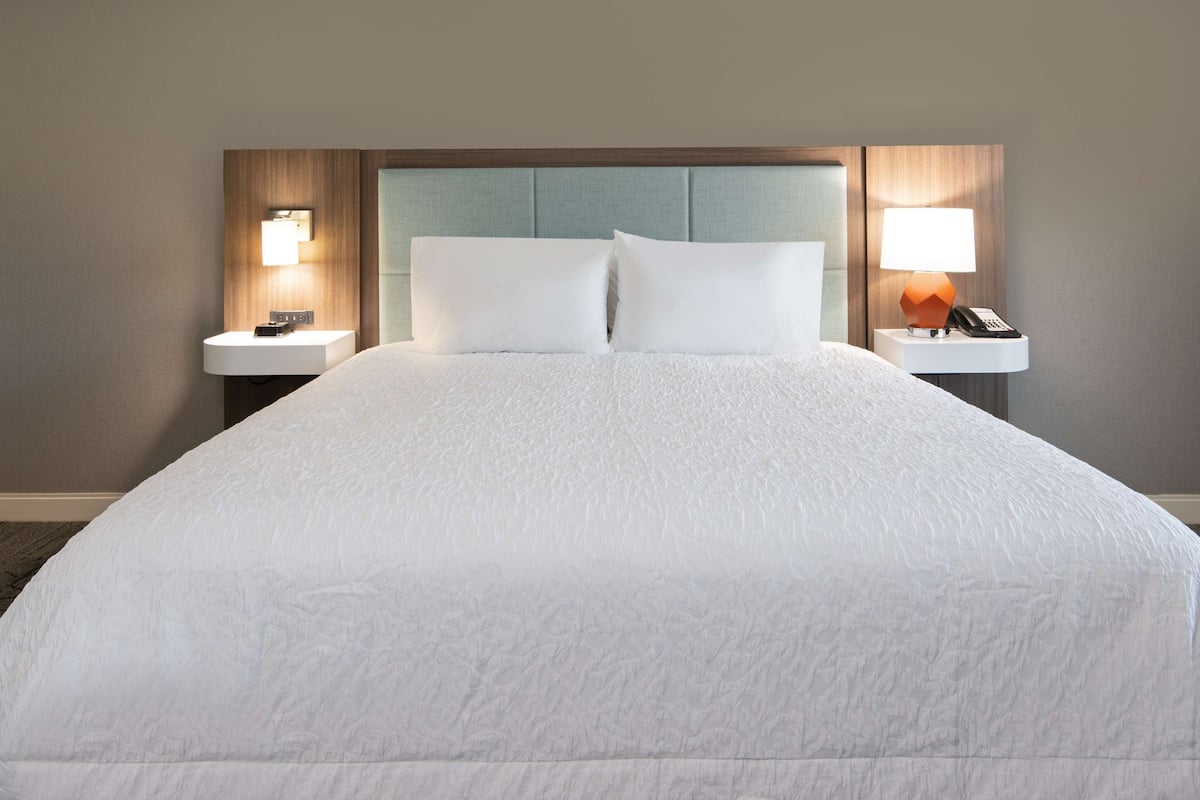 Room, 1 King Bed, Accessible (Mobility & Hearing, Roll-in Shower) | Desk, laptop workspace, free WiFi, bed sheets