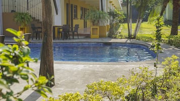 Outdoor pool, open 8:00 AM to 10:00 PM, sun loungers