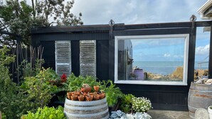 Property grounds -  Absolute Beach Front. Wake up to see the sun rise (Haumaona)