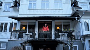 A hotel facade with a sign reading "HOTEL TABERG."