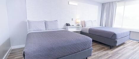 Habitación doble familiar, 2 camas Queen size | Ropa de cama hipoalergénica y edredón