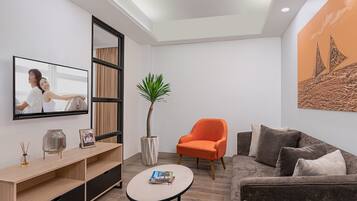 Chambre Deluxe, 1 chambre | Coin séjour