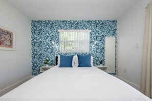 2 bedrooms, laptop workspace, iron/ironing board, travel cot