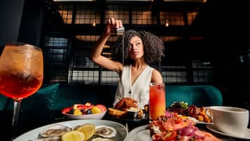 Breakfast, lunch, dinner served; al fresco dining