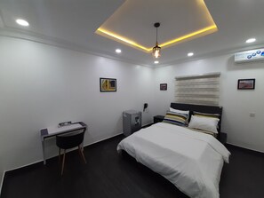 Desk, laptop workspace, iron/ironing board, rollaway beds