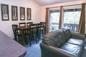 Condo, Multiple Beds, Fireplace, River View | Living room | 42-inch TV with cable channels, fireplace - Fawn Valley Inn: 210 (Estes Park)