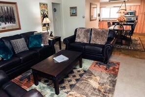 Apartment, Multiple Beds, Fireplace, River View | Living room