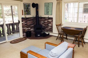 Condo, 1 King Bed, Balcony, River View | Living room | 42-inch TV with cable channels, fireplace - Fawn Valley Inn: 229 (Estes Park)