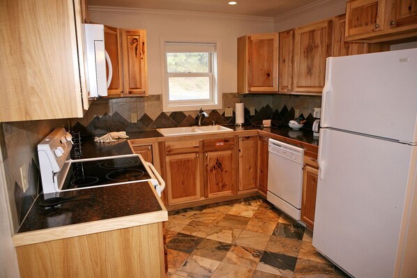 Condo, Multiple Beds, Hot Tub, River View | Private kitchen | Fridge, microwave, stovetop, dishwasher
