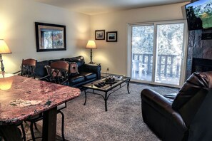 Apartment, 1 Queen Bed, Fireplace, River View | Living room