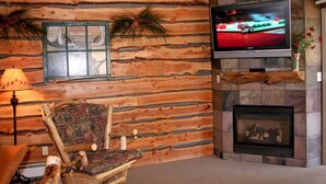 Condo, 1 King Bed, Hot Tub, River View | Living area | 42-inch TV with cable channels, fireplace - Fawn Valley Inn: 300 (Estes Park)