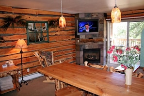 Condo, 1 King Bed, Hot Tub, River View | Living room | 42-inch TV with cable channels, fireplace