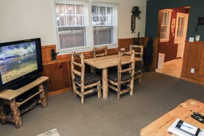 Apartment, Multiple Beds, Hot Tub | Living room | 42-inch TV with cable channels