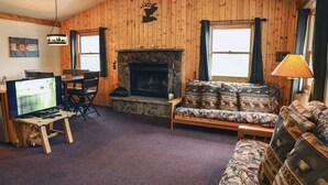 House, Multiple Beds, Fireplace, Mountain View | Living room | 42-inch TV with cable channels, fireplace, DVD player - Lazy R Cottages: 7A (Estes Park)