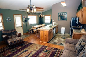 Apartment, Multiple Beds, Hot Tub | Living room | 42-inch TV with cable channels, fireplace, DVD player