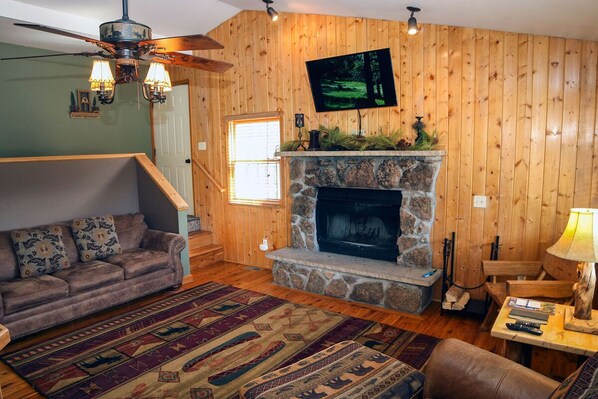 Apartment, Multiple Beds, Hot Tub | Living room | 42-inch TV with cable channels, fireplace, DVD player - Lazy R Cottages: 15 (Estes Park)