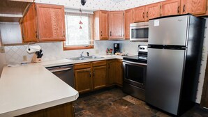 Cabane, plusieurs lits, bain à remous | Cuisine privée