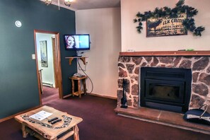 Chalet, Multiple Beds, Private Pool | Living room | Fireplace