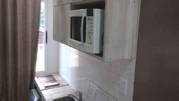 Fridge, microwave, cookware/dishes/utensils