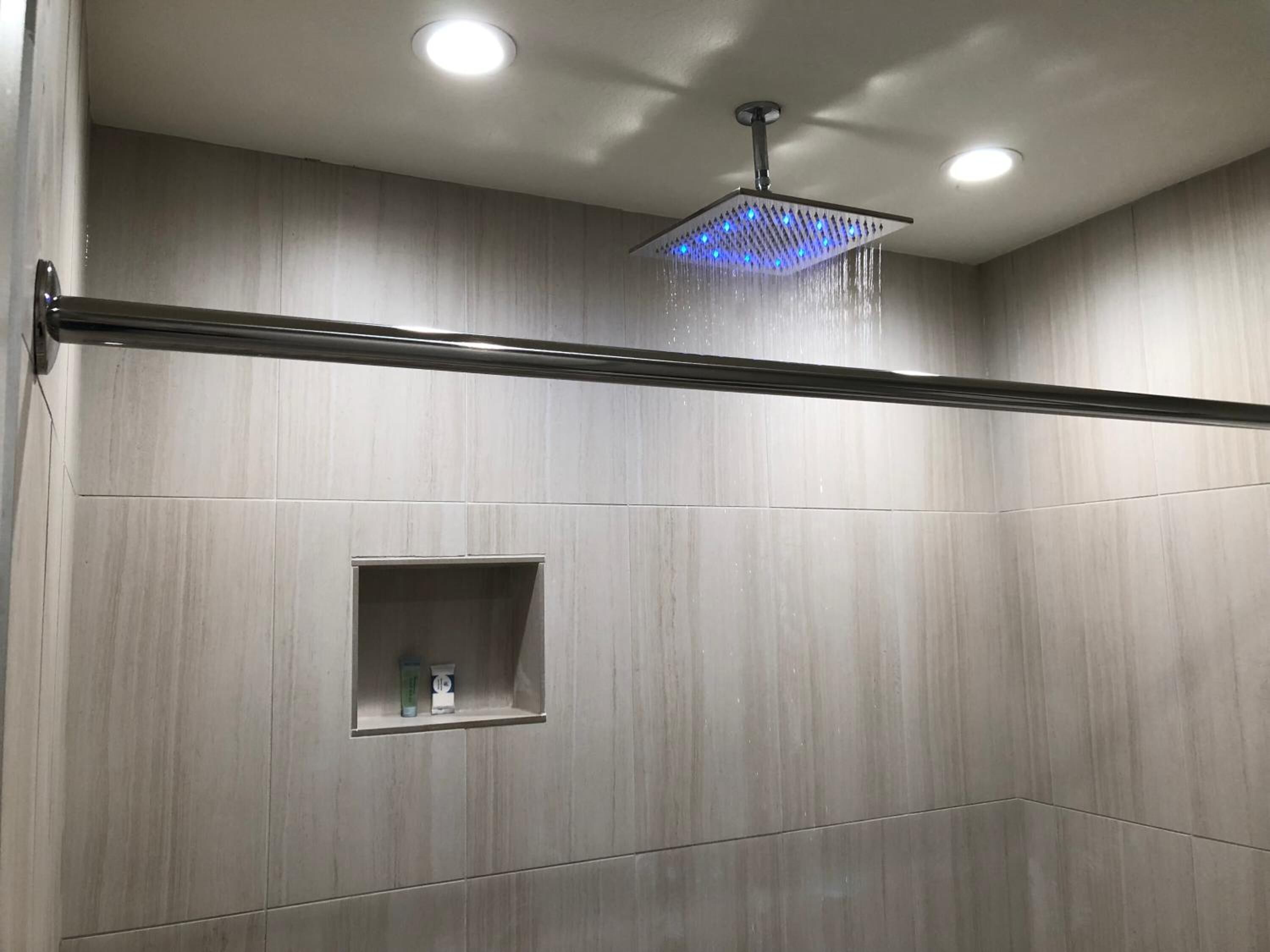 Shower, rainfall showerhead, free toiletries, hair dryer