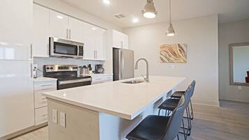 Apartment | Private kitchen | Fridge, microwave, oven, stovetop
