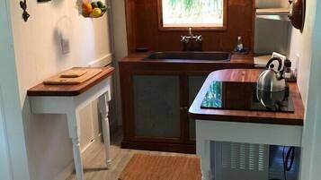 Cottage, Bay View (Penelope's Cottage, Porch, Kitchen) | Private kitchen | Coffee/tea maker, electric kettle