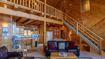 Een televisie, een open haard, tafelvoetbal en boeken