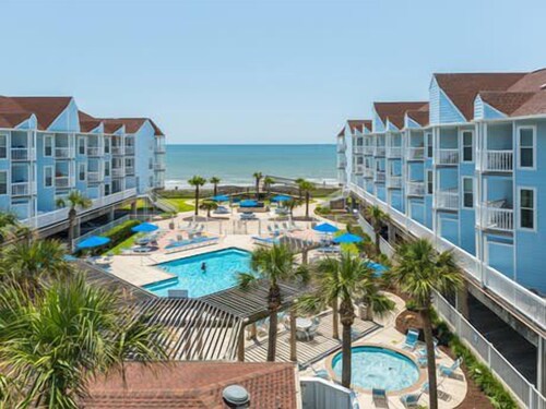 RENOVATED BEACHSIDE Condo-Elevator-Heated Pool-in unit Washer/Dryer 