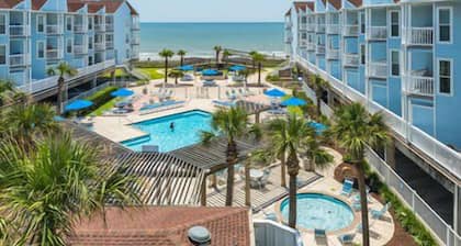 RENOVATED BEACHSIDE Condo-Elevator-Heated Pool-in unit Washer/Dryer