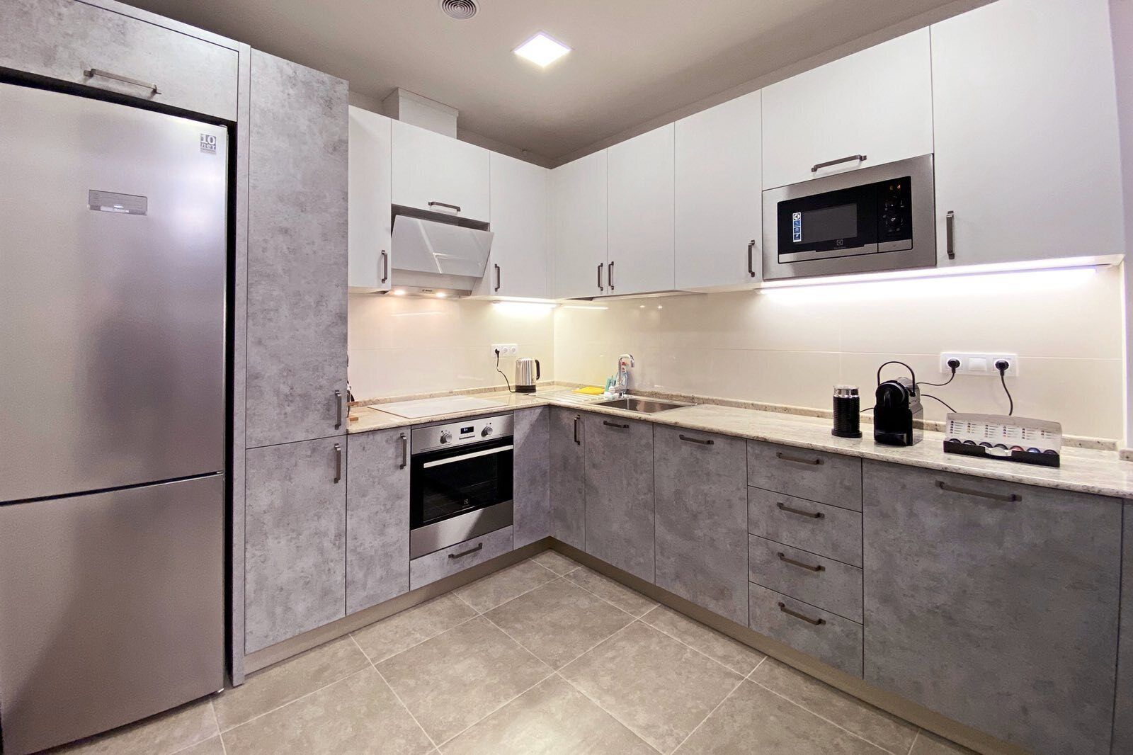 Fridge, coffee/tea maker, cookware/dishes/utensils