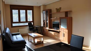 Apartment, 2 Bedrooms | Living room | Flat-screen TV