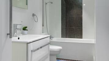 Separate bathtub and shower, free toiletries, hair dryer, towels