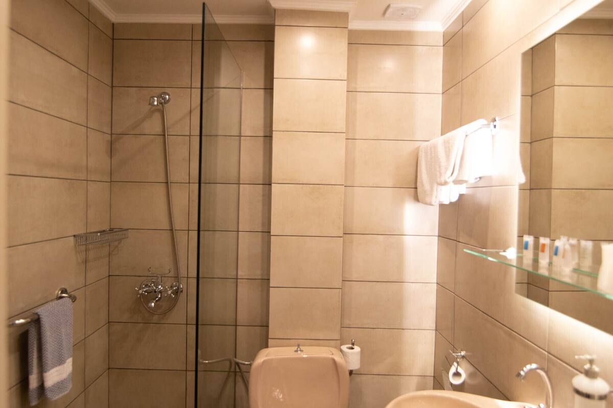 deep-soaking bathtub, free toiletries, hair dryer, slippers