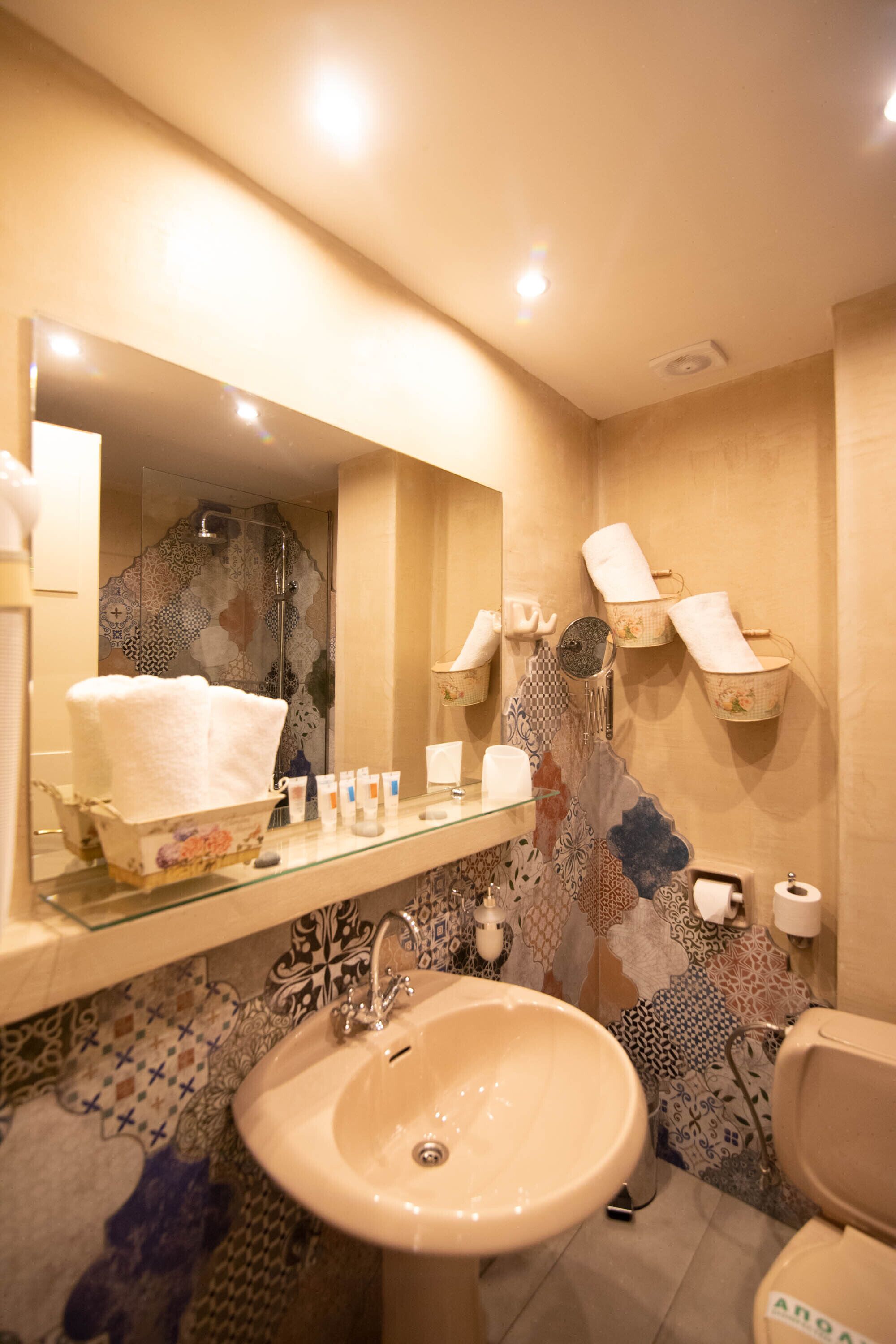 deep-soaking bathtub, free toiletries, hair dryer, slippers