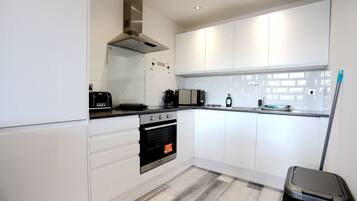 Apartment | Private kitchen | Full-sized fridge, microwave, oven, stovetop