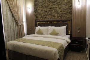 Egyptian cotton sheets, premium bedding, memory foam beds, in-room safe