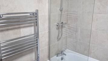 Apartment | Bathroom | Combined shower/tub, deep soaking tub, hair dryer, towels