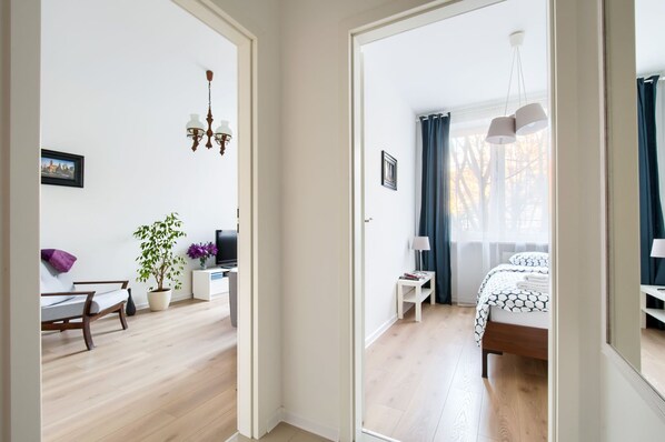 Superior Apartment | Living area | 40-inch flat-screen TV with cable channels, TV, video-game console - Gama Elektoralna Traveler's Apartment (Warsaw)