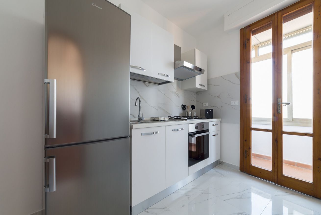 Frigorifero, forno, piano cottura, macchina per tè/caffè