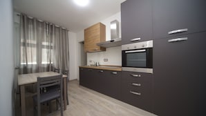 Family Room | Private kitchen - IL BACIO Guest House (Perugia)