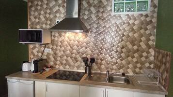 Fridge, microwave, stovetop, coffee/tea maker