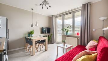 Superior Apartment | Living room | 36-inch flat-screen TV with cable channels, TV