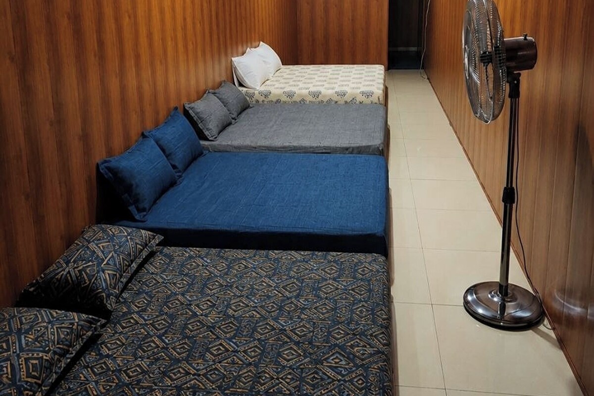 Habitación, varias camas | Ropa de cama