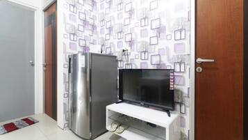 Apartamento, 2 quartos | Escrivaninha, Wi-Fi de cortesia, roupa de cama