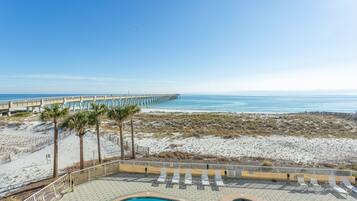 On the beach, sun-loungers