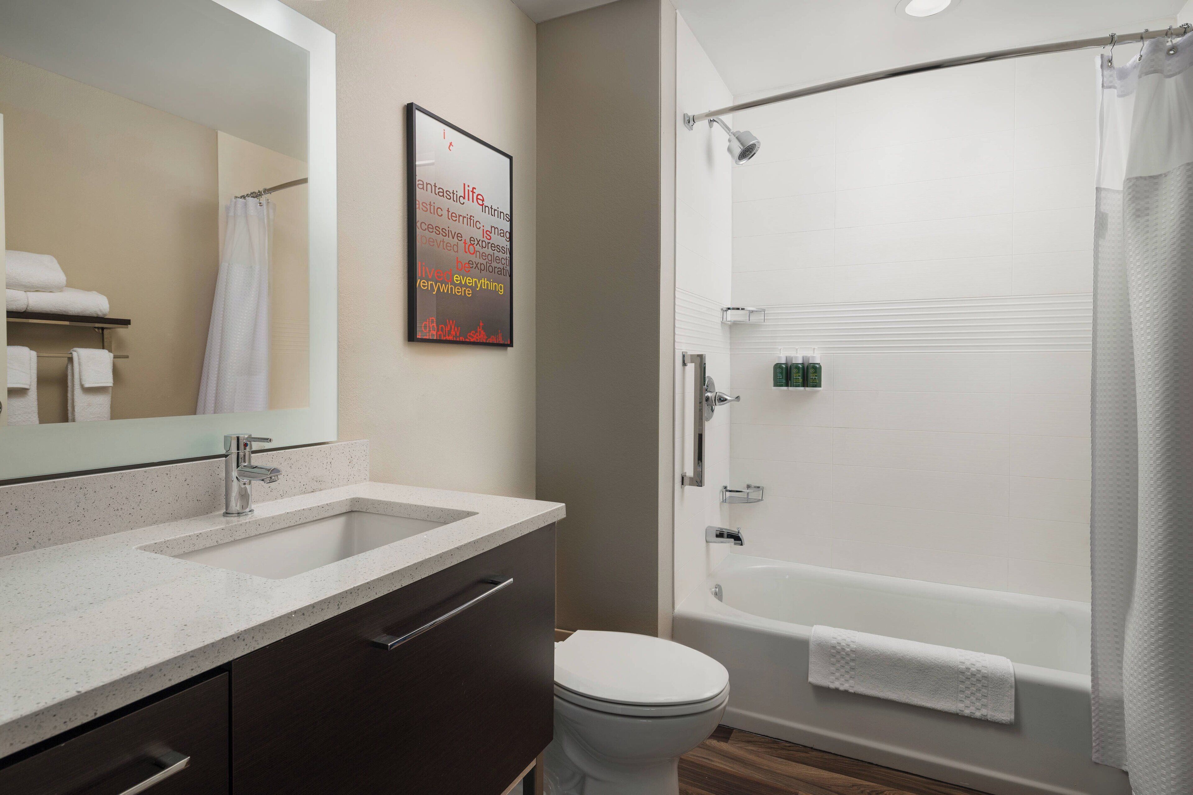 combined shower/bathtub, free toiletries, hair dryer, towels