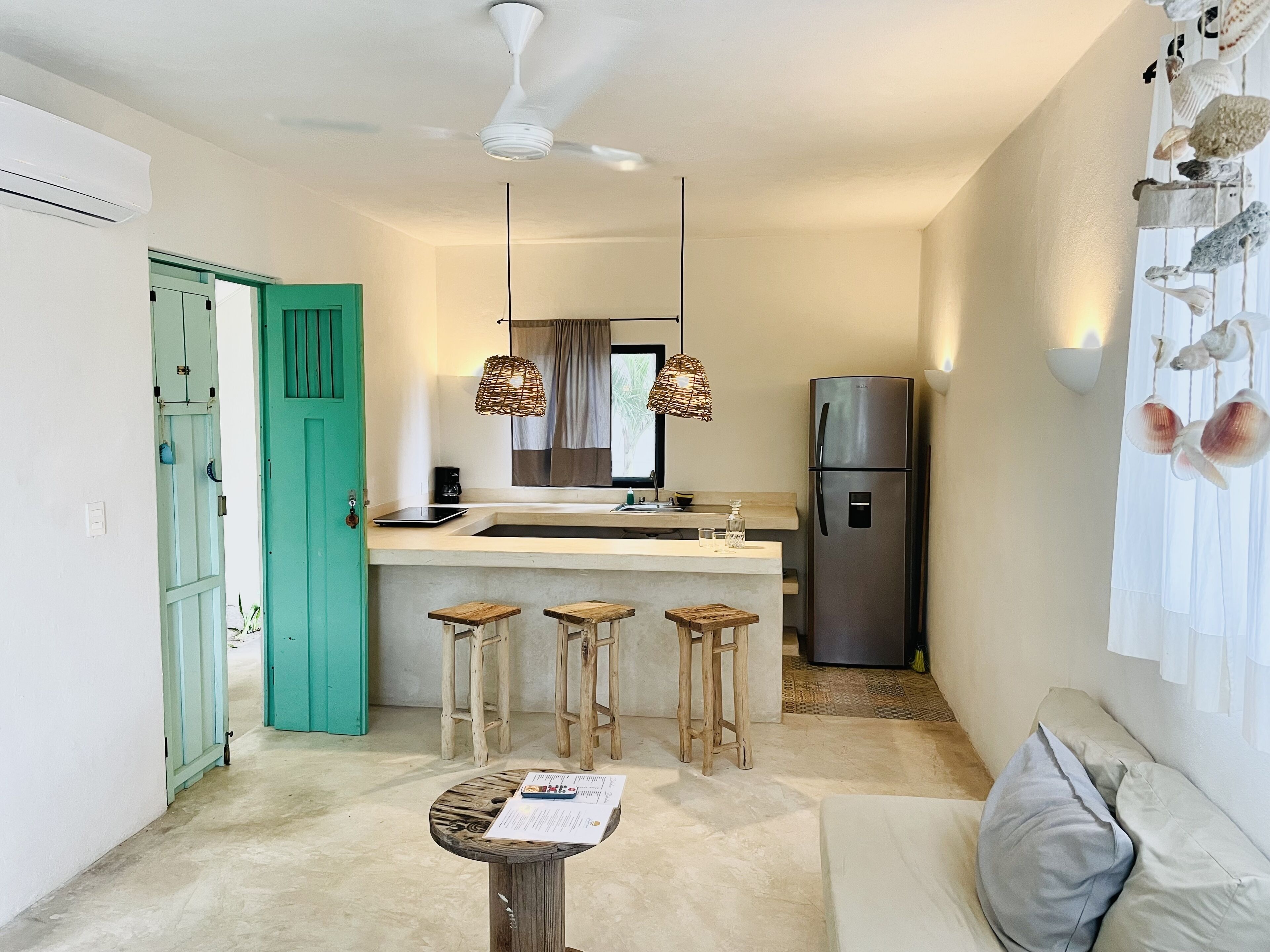 arena suite with garden/pool view | private kitchen | stovetop, cookware/dishes/utensils